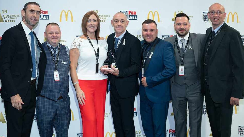 FOLLO FC officials pictured at last year’s awards bash with Martin Keown