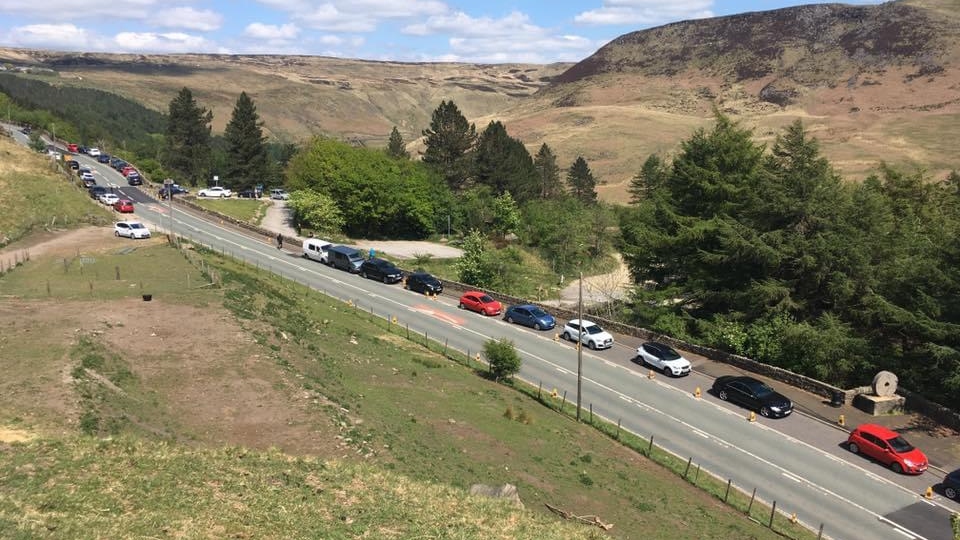 This picture, taken shortly after 2pm yesterday afternoon, highlights how motorists completely ignored the no parking signs on the main A635 Greenfield to Holmfirth Road at Binn Green This picture, taken shortly after 2pm yesterday afternoon, highlights how motorists completely ignored the no parking signs on the main A635 Greenfield to Holmfirth Road at Binn Green