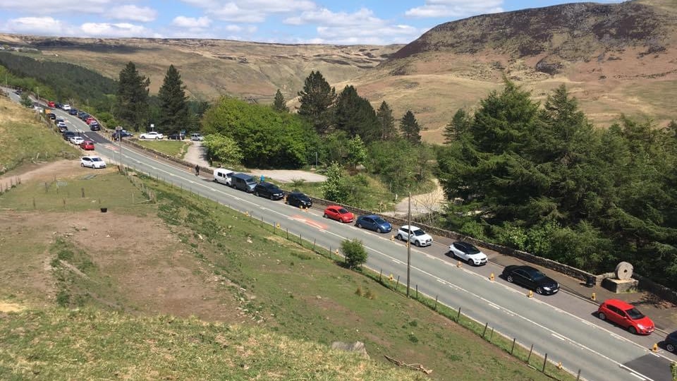 This picture, taken shortly after 2pm yesterday afternoon, highlights how motorists completely ignored the no parking signs on the main A635 Greenfield to Holmfirth Road at Binn Green