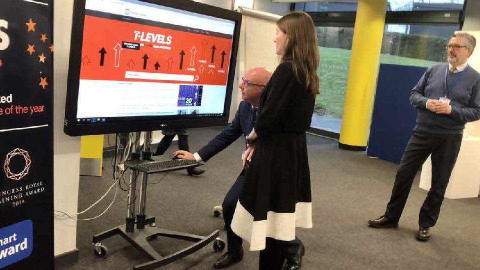 Education Minister Michelle Donlan MP is pictured getting a personal preview of the new Oldham Technical Education website on a recent visit to Oldham College. (Left to right: Alan Benvie (Oldham College, Assistant Principal) with Michelle Donlan (Children’s Minister) and Alun Francis (Oldham College Principal)