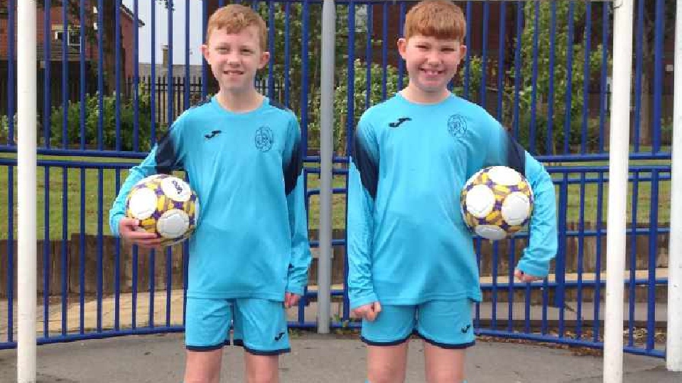 Twins Daniel (left) and Jake Smith show off the smart new St Mary's strip