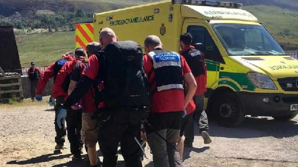 The casualty is helped into a waiting ambulance The casualty is helped into a waiting ambulance