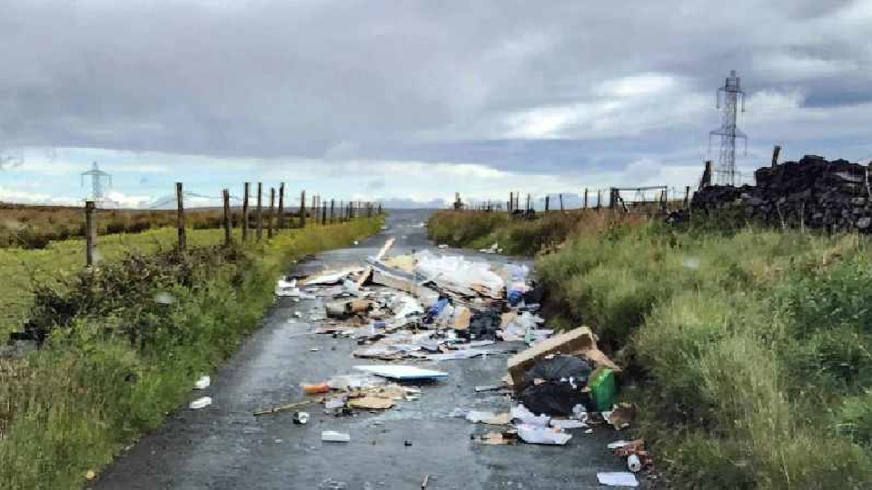 A route was blocked by rubble and rubbish at High Lee Lane in Delph