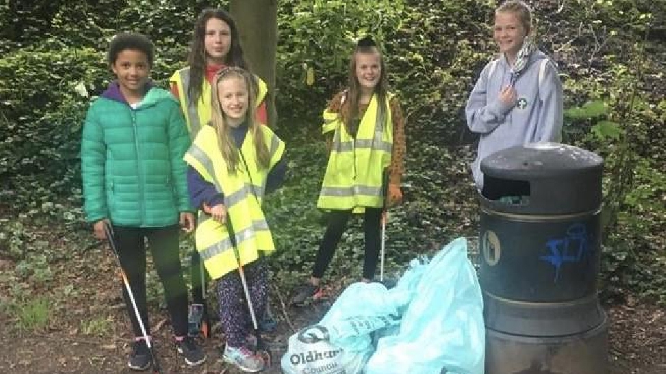 The five youngsters are pictured (left to right) with some of the rubbish: Amy Cummings, Millie Foster, Mary Brierley, Lola Simpson and Alice Winfield