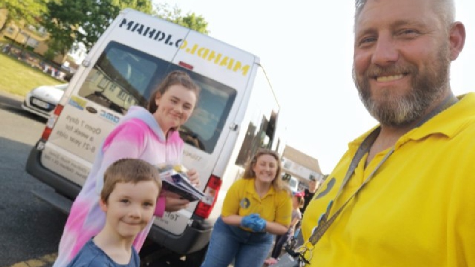 Mahdlo team members Mark Gilligan and Kate Bennett delivering activity packs to children during lockdown with the Youth Zone minibus which was stolen last month