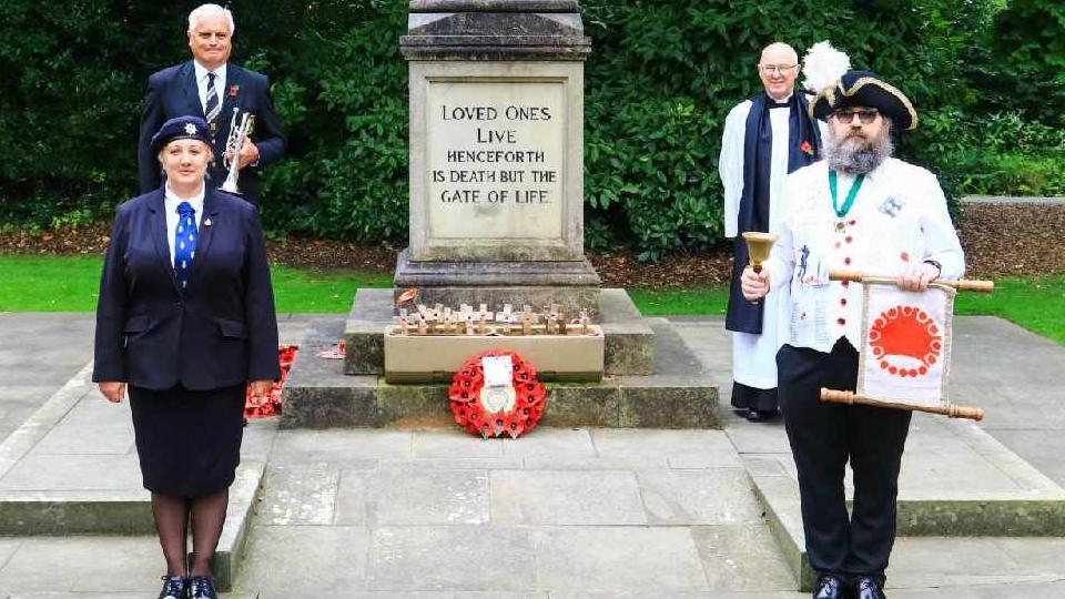 The VJ Day 75 scene at Uppermill. Front: Alison Clowes and town crier Marcus Emms, rear: John Whittle and Rev John Rosedale The VJ Day 75 scene at Uppermill. Front: Alison Clowes and town crier Marcus Emms, rear: John Whittle and Rev John Rosedale