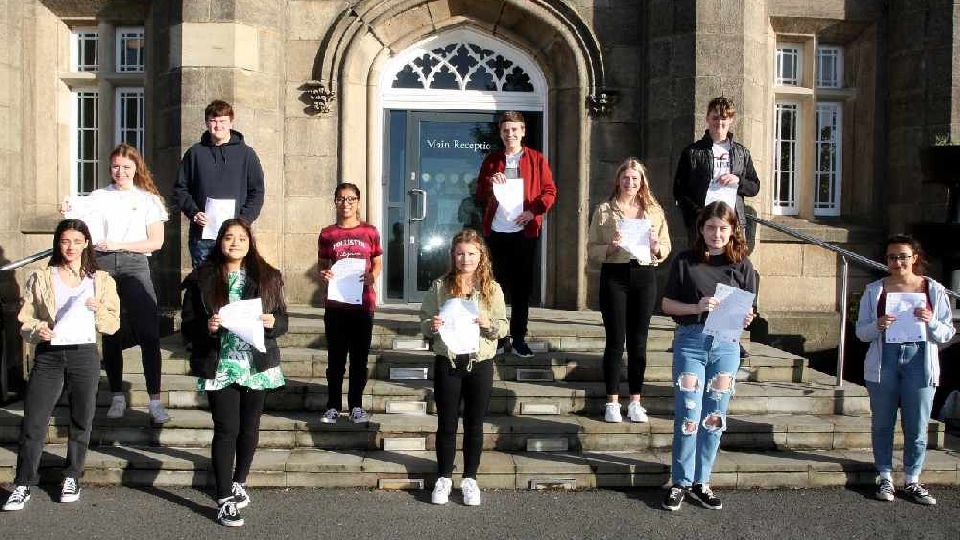 Students with their results at The Blue Coat School Students with their results at The Blue Coat School