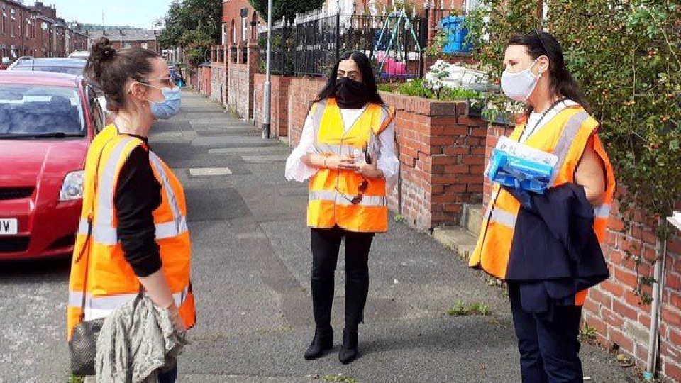 l to r: Alex Birtles, NHS Test and Trace, talking to Arooj Shah, deputy leader of the council, and Debbie Abrahams MP, as they take the Covid safety messages to residents in Clarksfield. l to r: Alex Birtles, NHS Test and Trace, talking to Arooj Shah, deputy leader of the council, and Debbie Abrahams MP, as they take the Covid safety messages to residents in Clarksfield.