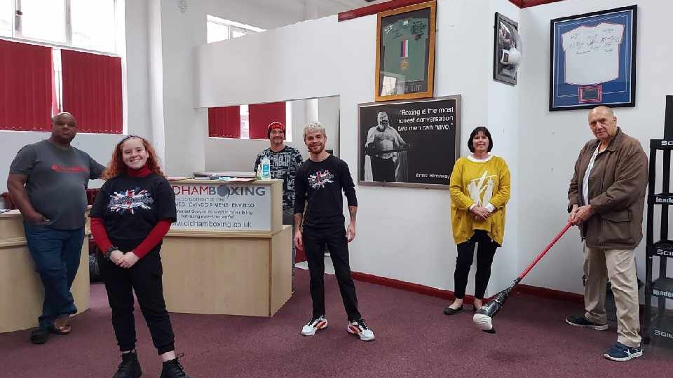 Eric Noi is pictured (left) with the visitors from Brit Theatre