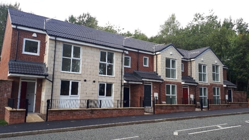 The new three-bedroom homes on Wellyhole Street in Lees