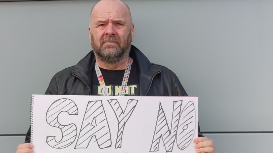 Campaigner Brian Banawich outside United Utilities Headquarters in Warrington 