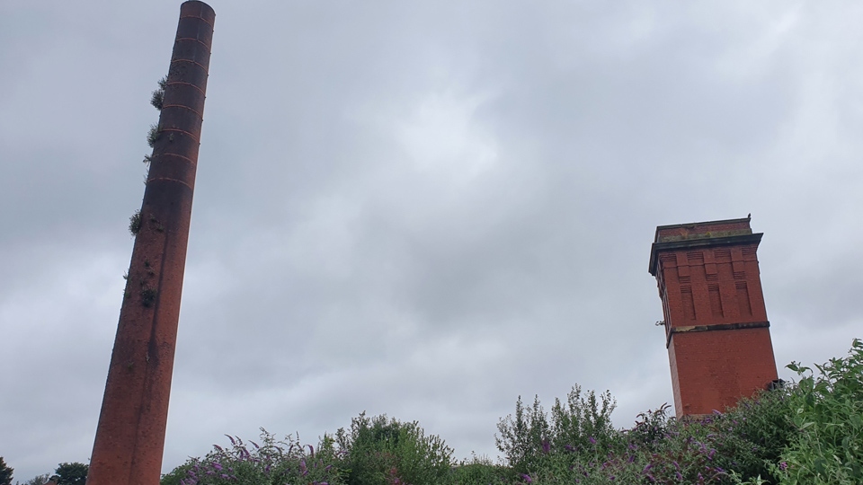 The remaining tower and chimney of Maple Mill in Hathershaw