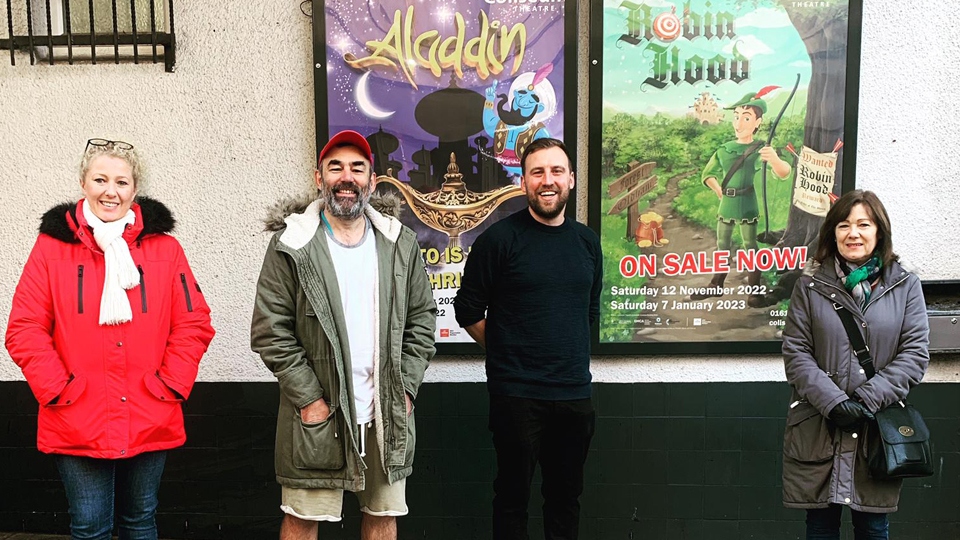 Artistic Director Chris Lawson with members of the queue to book tickets a year in advance for Robin Hood at Oldham Coliseum