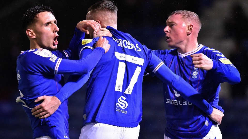 Callum Whelan, Nicky Adams and Jack Stobbs celebrate Latics' fifth goal of the game