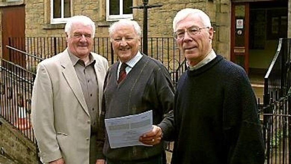 Colin Smith is pictured (left) outside the Millgate Arts Centre in Delph in 2011 during the time he was Chair of Trustees. Then stage director Ken Wright and treasurer David Shipp are also on the picture