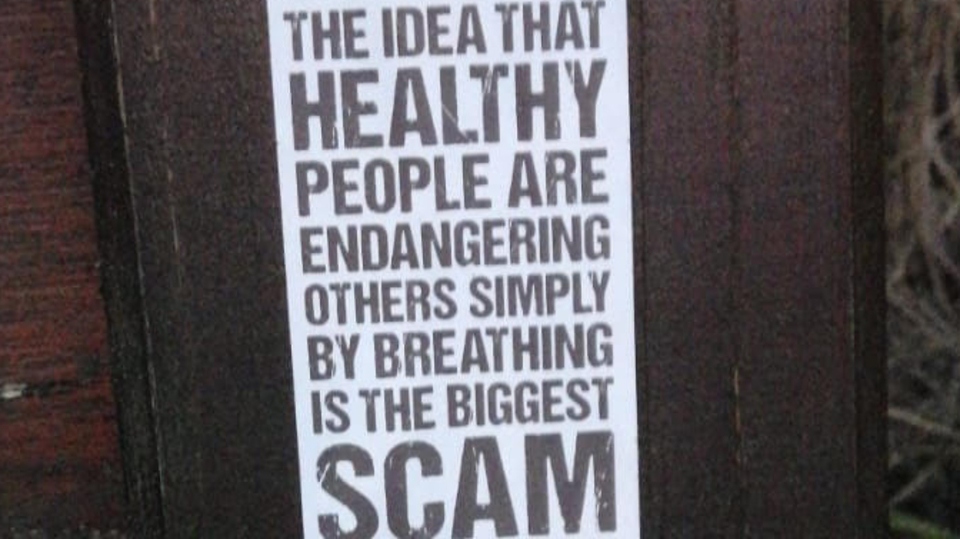 One of the posters put up in Middleton by Covid-sceptic group The White Rose One of the posters put up in Middleton by Covid-sceptic group The White Rose