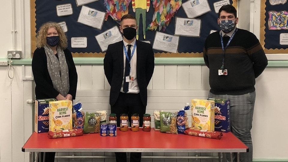 Werneth Primary Pastoral Lead Jackie Hodgkiss (left) is pictured with School Principal Jonathan Bell (centre) and Teaching Assistant Paul Greenwood