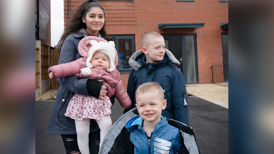 Louise's children celebrating their new home