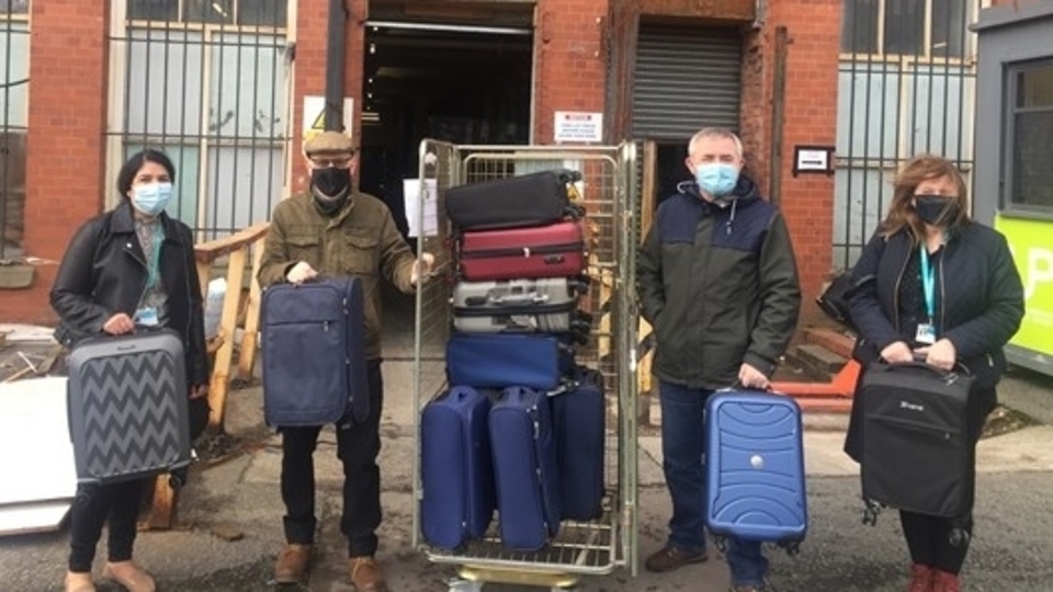 Chadderton firm Ultimate Products have made things a little bit easier with the donation of thousands of pounds worth of key household items - from suitcases to ironing boards, from pots and pans to kettles
