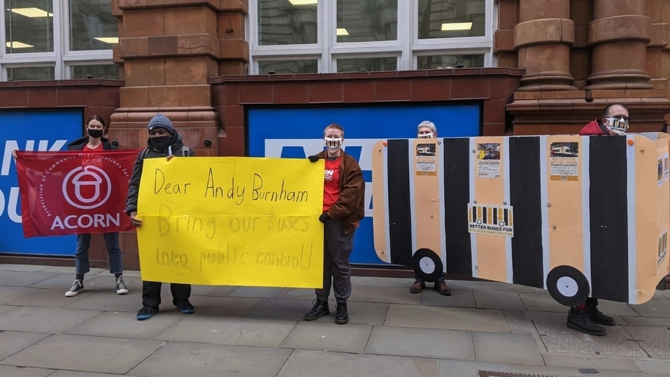 Activists from Better Buses for Greater Manchester and Acorn delivering letters in support of bus franchising to Andy Burnham\'s offices