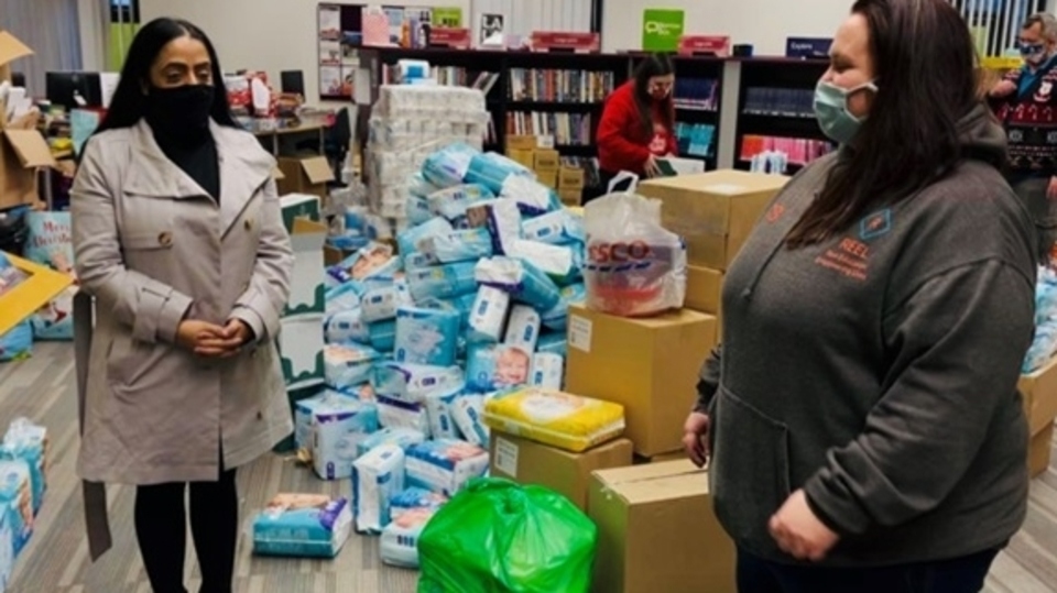 Councillor Arooj Shah is pictured visiting a local foodbank in Oldham