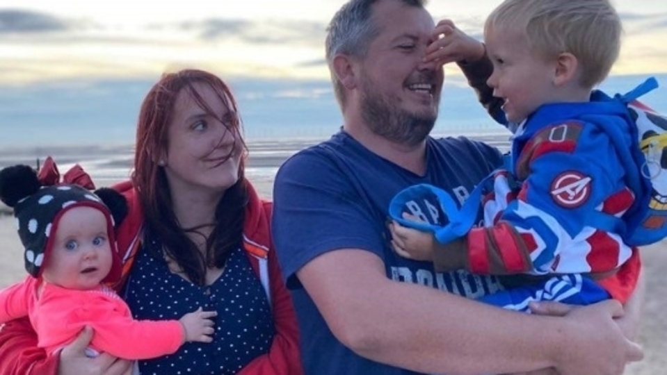 Graham Rogers and his wife Kim, and their young children Graham Rogers and his wife Kim, and their young children