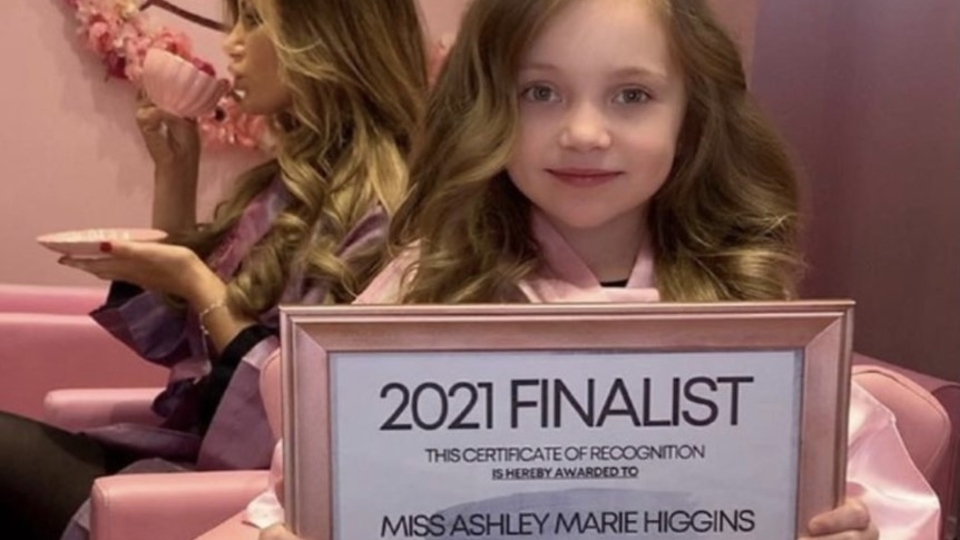 Salon owner Ashley Higgins is in the rear of the picture Salon owner Ashley Higgins is in the rear of the picture