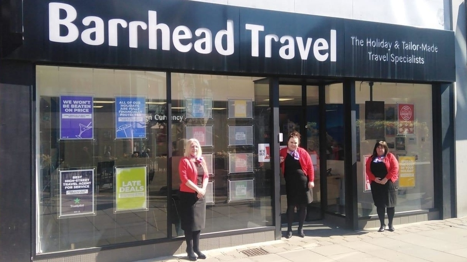 Louise Jones, Laura Hatch and Elise Jamieson are pictured outside Barrhead Travel's Oldham office