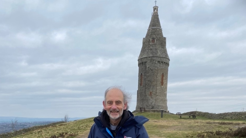 Dr Ian Brett is pictured at Hartshead Pike