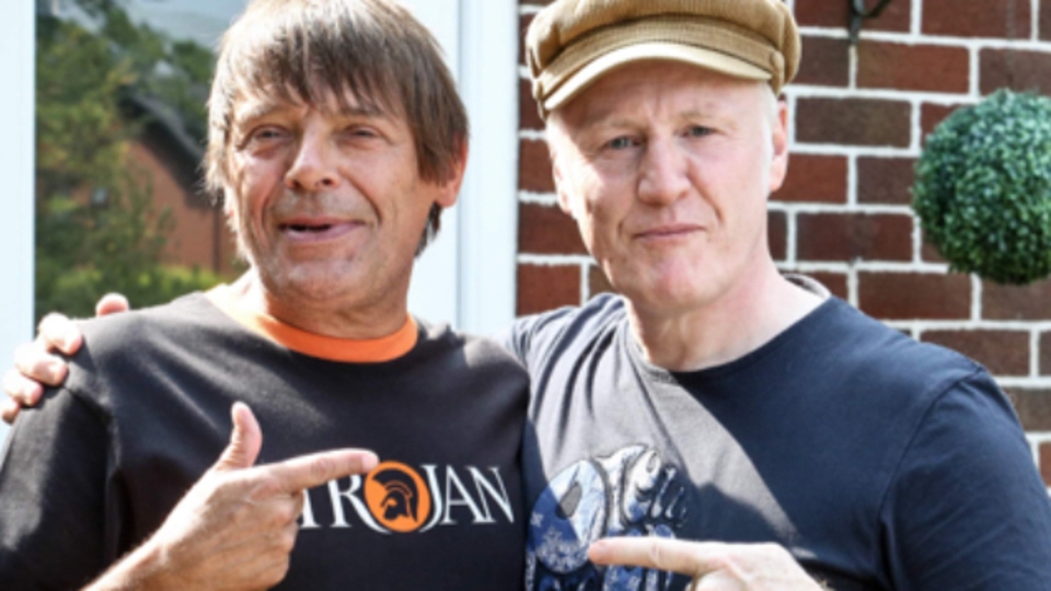 Chris Green is pictured (right) on set with Mani, of Stones Roses fame