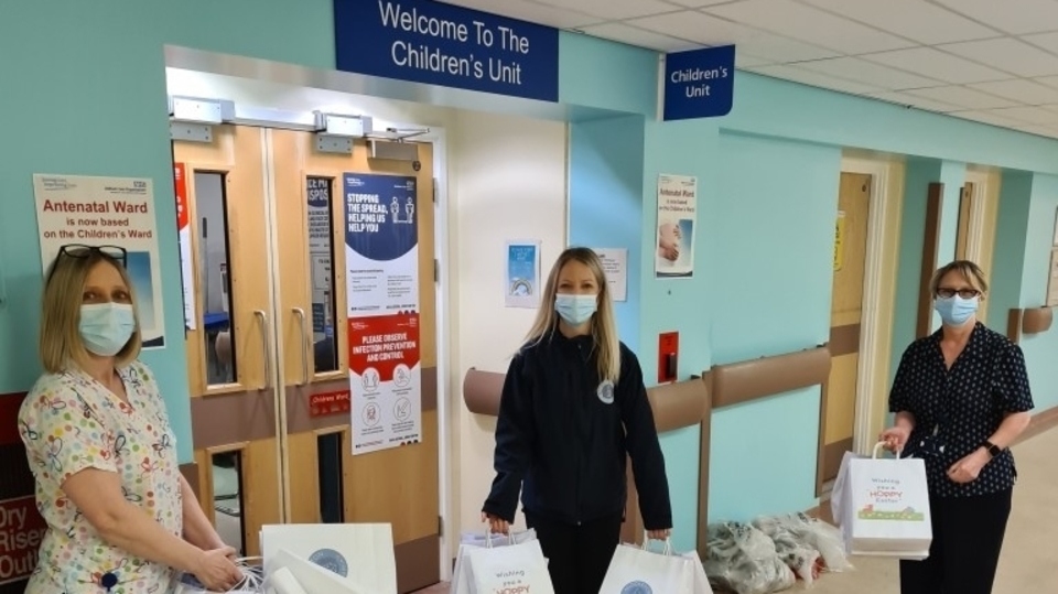 NorthCare Charity volunteers Nicky Barrett and Ilyas Aslam are pictured with Lisa McMahon from the Royal Oldham children's ward