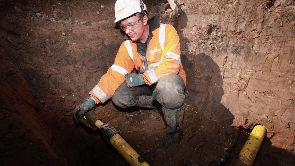 An engineer replacing gas mains An engineer replacing gas mains