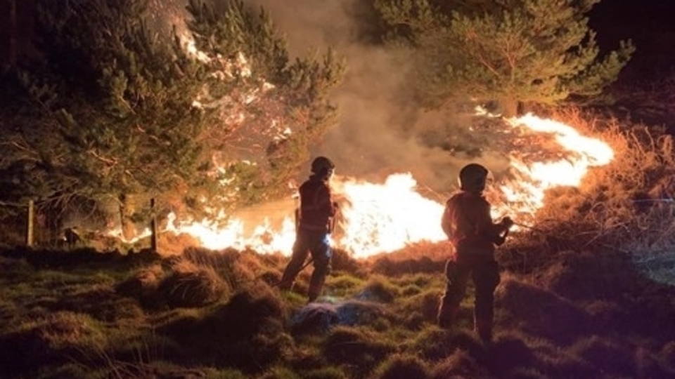 Firefighters tackle last night's blaze near Bank Lane. Images courtesy of GMFRS