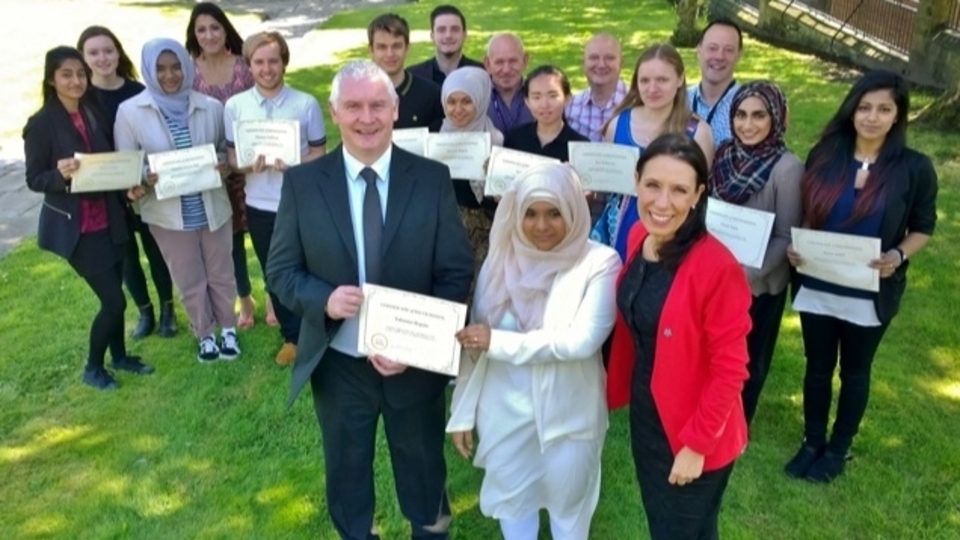 Debbie Abrahams was joined by Bryn Hughes, founder and trustee of the PC Nicola Hughes Memorial Fund, awarding certificates to participants at a former, pre-Covid, summer school Debbie Abrahams was joined by Bryn Hughes, founder and trustee of the PC Nicola Hughes Memorial Fund, awarding certificates to participants at a former, pre-Covid, summer school