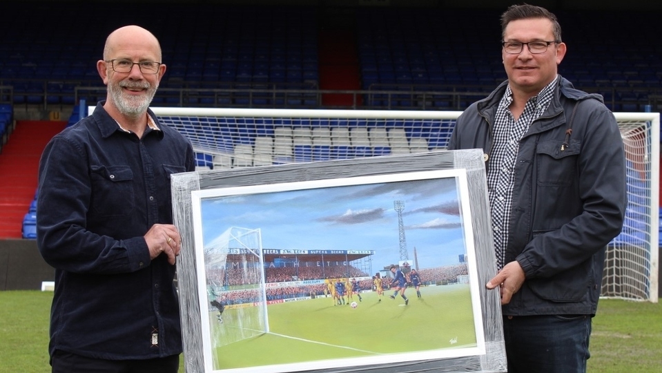 Andrew Mellor and Paul Town are pictured with the new artwork