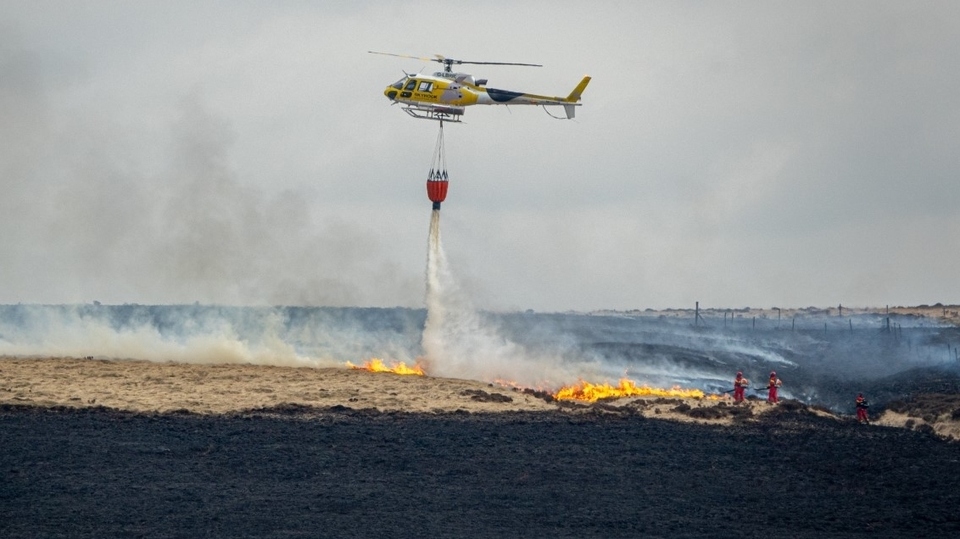 Firefighters battle the most recent fire on Marsden Moor in April 2021. Image courtesy of National Trust Images/Victoria Holland Firefighters battle the most recent fire on Marsden Moor in April 2021. Image courtesy of National Trust Images/Victoria Holland