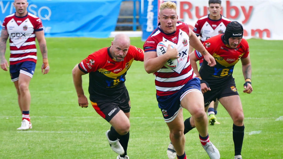 Tyler Dupree makes a break against the Rams. Image courtesy of ORLFC