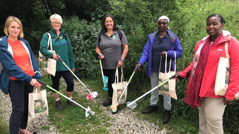 Litter pickers at the ready: left to right – Sarah Slowther, Peak District National Park volunteer Alison Farthing, Gina Bradbury Fox, Peak District Mosaic members Elaine Hamilton and Yvonne Witter.