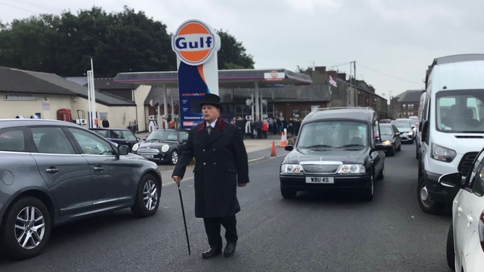 The service was held on the filling station forecourt
