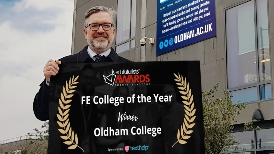 Alun Francis, Oldham College Principal and Chief Executive, is pictured celebrating the ‘FE College of the Year’ Award 2021 from Edufuturists