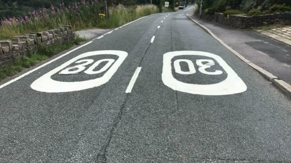 Just what does the speed limit read? Just what does the speed limit read?