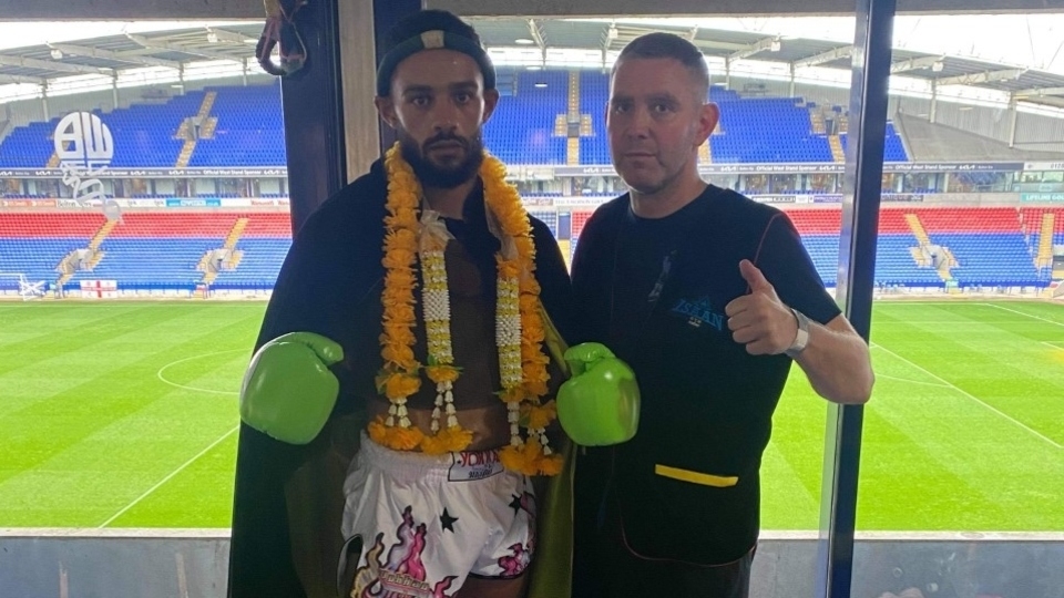 Isaan Gym Head Coach Steve Donnelly is pictured (right) with victorious Connor Bourne Isaan Gym Head Coach Steve Donnelly is pictured (right) with victorious Connor Bourne