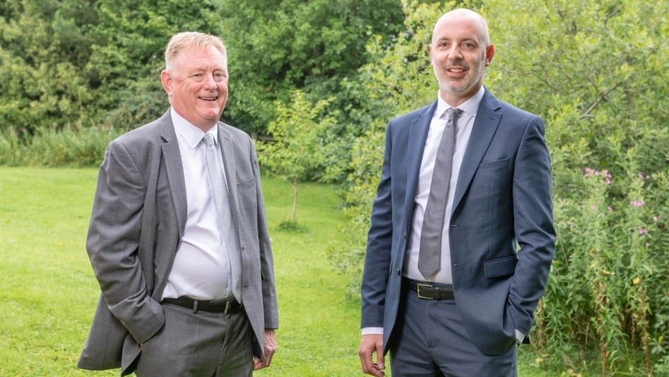 Ryder and Dutton managing director, Richard Powell, is pictured (left) with new Group managing director Mark Manning 