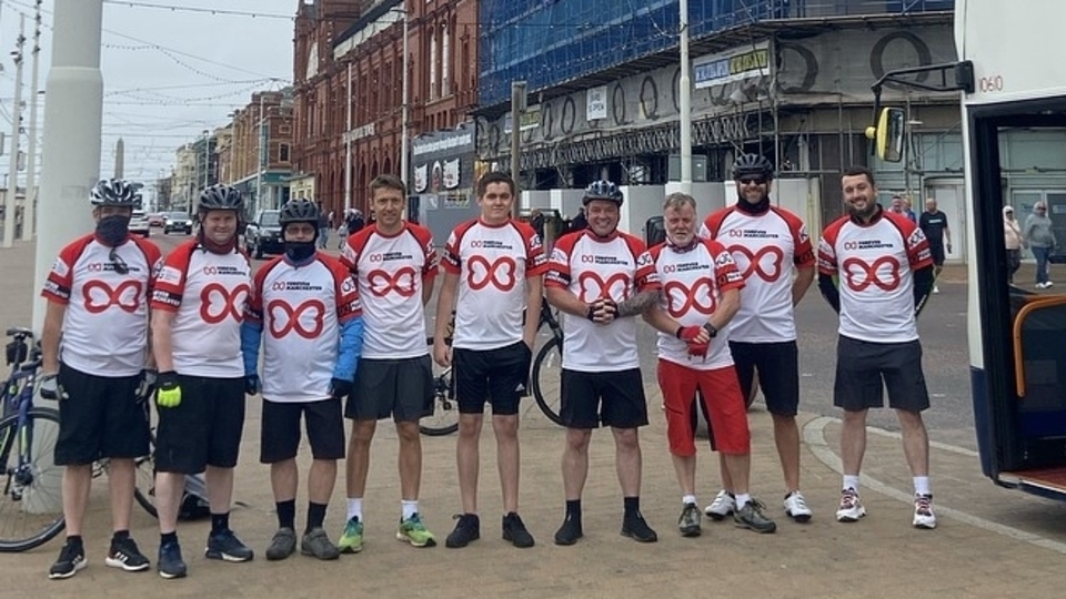 Nick Painter is pictured third from the right on Blackpool promenade (red shorts)