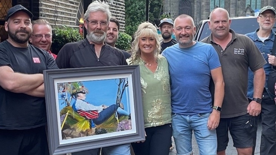 Pictured left to right are: Graeme Rotherham, Gary Croad, Graham Wood, Jack Williams, artist Linda Edwards, Adam Walker, David Biggs and Dave Holland