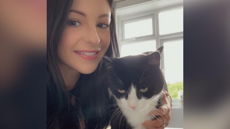 Jasmine Dickinson with Katie the cat Jasmine Dickinson with Katie the cat
