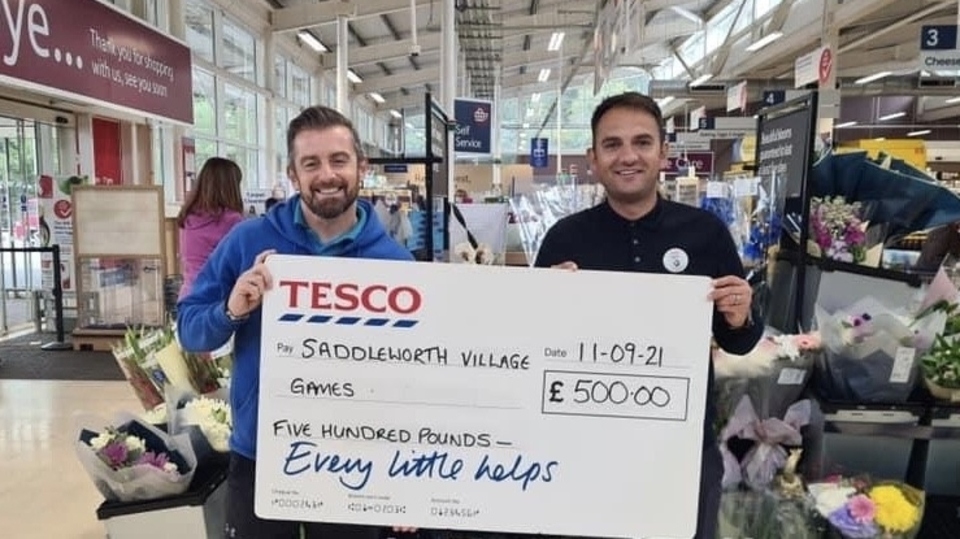 The Saddleworth Village Olympics team received a donation of £500 The Saddleworth Village Olympics team received a donation of £500