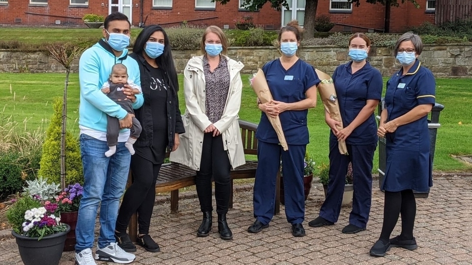 Baby Fariq Hussain Chowdhury and family with Kirsten Mitchell from SPOONS Charity, Royal Oldham Hospital Neonatal Nurses Katie Broadbent and Lauren Woolerton and Lead Nurse, Yvonne Fletcher