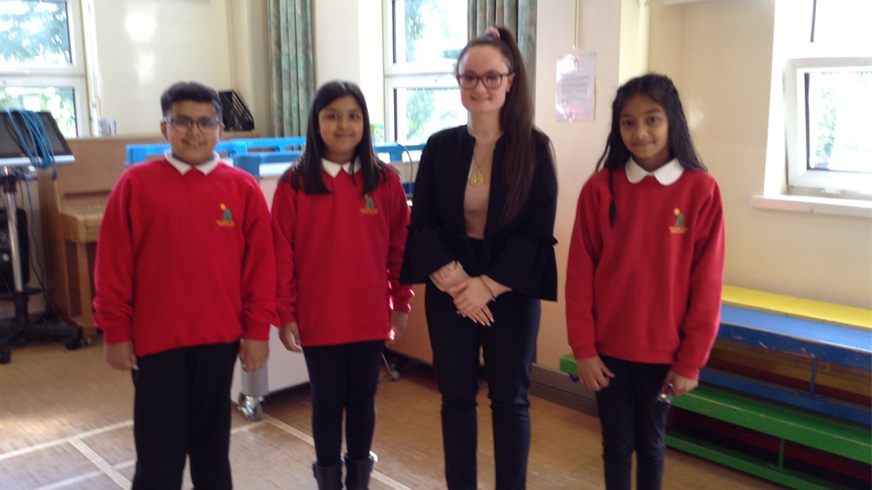 Oldham Youth Mayor Tia Henderson with pupils from Alexandra Park School