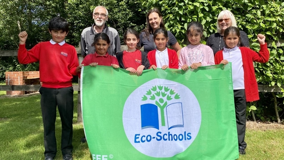 Pictured (left to right) are: Bill Barton (Site Manager), Debbie Schofield (Forest school leader) and Margret Skinner - who has helped with Eco coordinating - with some of the students involved in the project